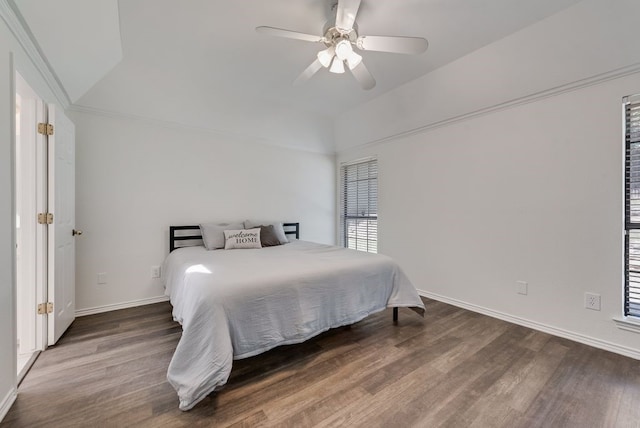 7020 Live Oak Dr, North Richland Hills, TX 76182 - bedroom with wood finished floors, a ceiling fan, baseboards, and vaulted ceiling