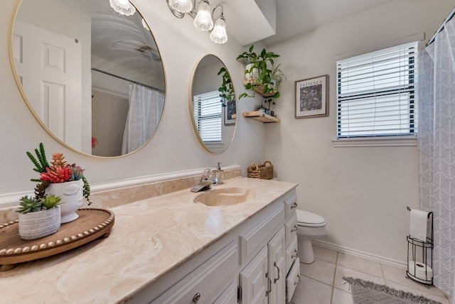 7020 Live Oak Dr, North Richland Hills, TX 76182 - full bath with vanity, tile patterned flooring, toilet, a shower with shower curtain, and baseboards