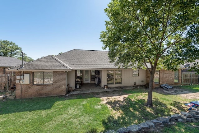 7020 Live Oak Dr, North Richland Hills, TX 76182 - back of house with brick siding and french doors