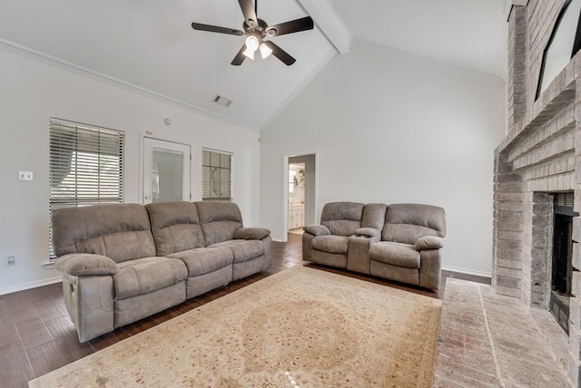 7020 Live Oak Dr, North Richland Hills, TX 76182 - living area featuring a fireplace, ceiling fan, beam ceiling, baseboards, and wood finished floors