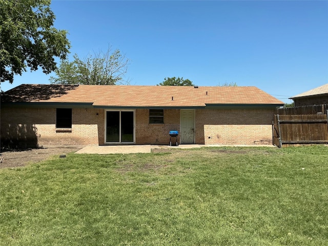 1403 Little St, Copperas Cove, TX 76522 - back of house with brick siding and roof with shingles