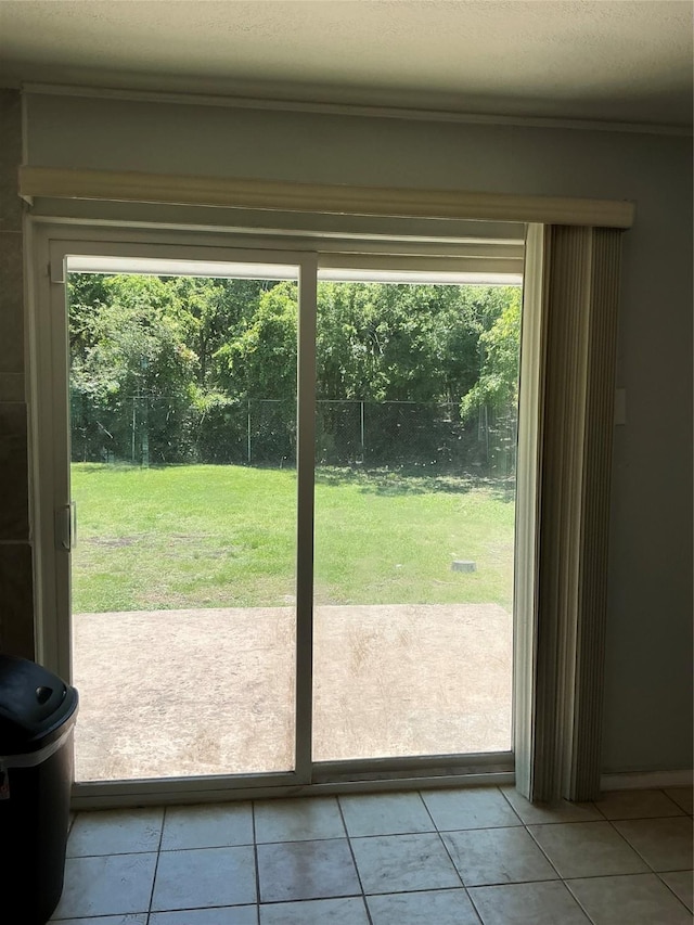 1403 Little St, Copperas Cove, TX 76522 - doorway with healthy amount of natural light and tile patterned floors