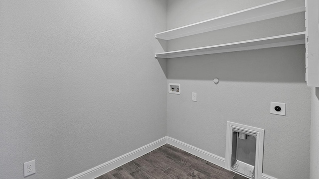 105 Leon Ave, Rhome, TX 76078 - laundry area with hookup for an electric dryer, hookup for a gas dryer, washer hookup, dark wood-style flooring, and baseboards