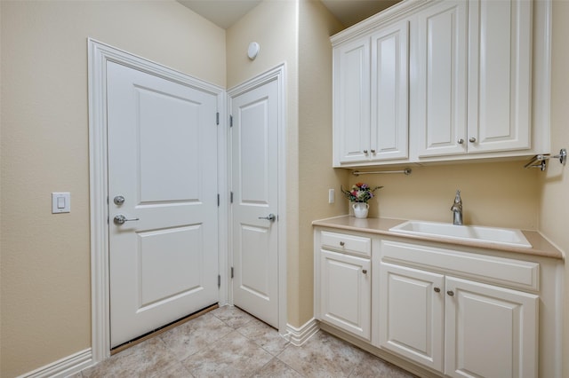 382 Burnswick Isles Way, Frisco, TX 75036 - entryway with a sink, light tile patterned flooring, and baseboards
