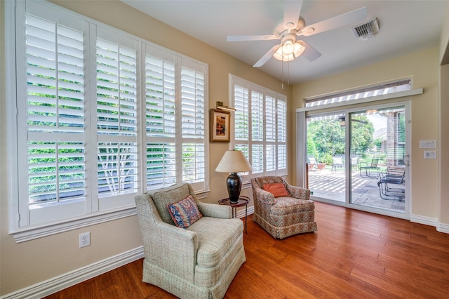 382 Burnswick Isles Way, Frisco, TX 75036 - living area with healthy amount of natural light, ceiling fan, and wood finished floors