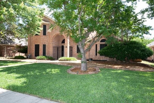 1111 Bayshore St, Allen, TX 75002 - view of front of property with a front yard and brick siding