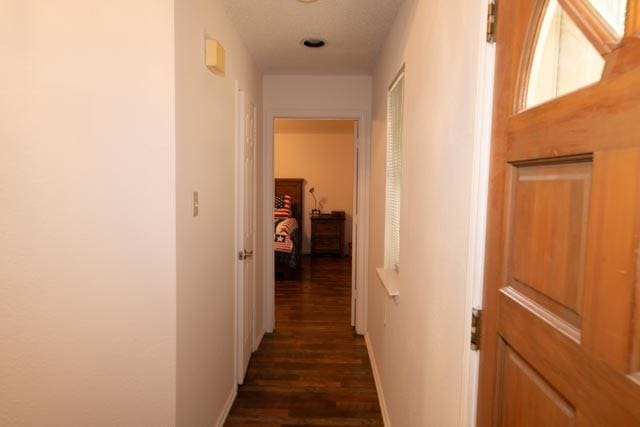 1111 Bayshore St, Allen, TX 75002 - hall featuring dark wood-type flooring and baseboards