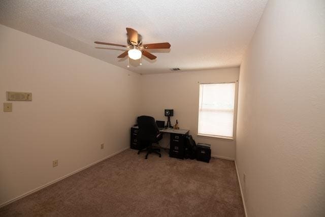 1111 Bayshore St, Allen, TX 75002 - home office featuring ceiling fan, carpet floors, and baseboards