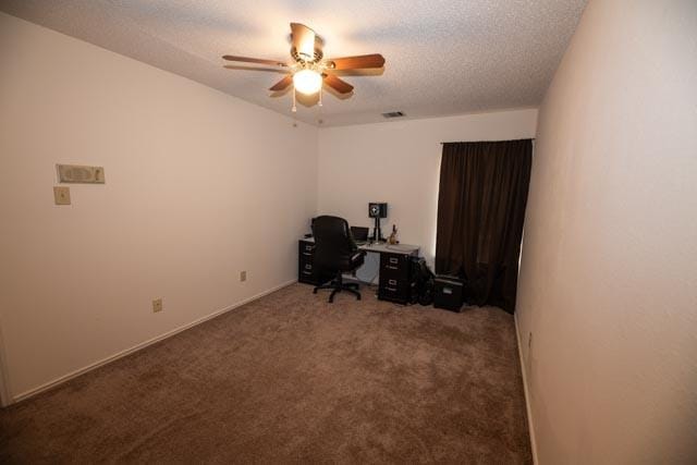 1111 Bayshore St, Allen, TX 75002 - office area with carpet floors, a ceiling fan, a textured ceiling, and baseboards