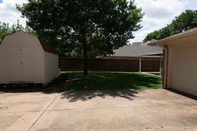 1111 Bayshore St, Allen, TX 75002 - view of patio with a garage