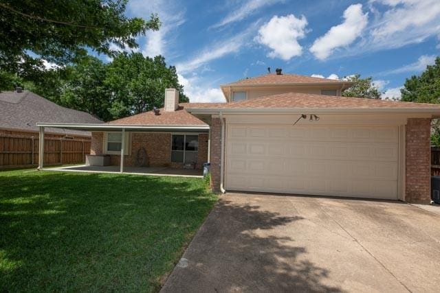 1111 Bayshore St, Allen, TX 75002 - view of front of property with driveway, brick siding, a chimney, and a garage