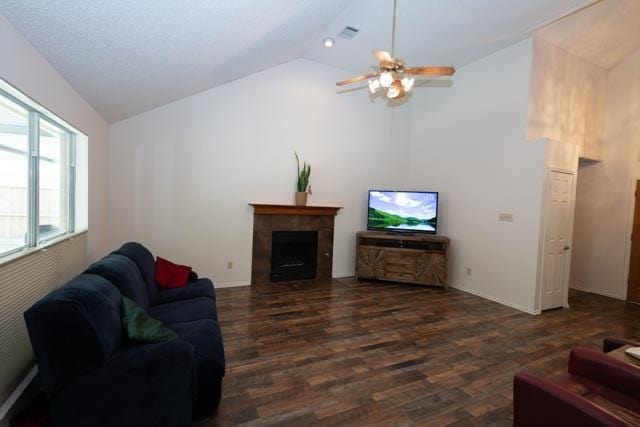 1111 Bayshore St, Allen, TX 75002 - living area with dark wood-style flooring, ceiling fan, a fireplace, high vaulted ceiling, and baseboards