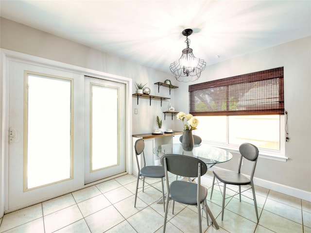 3609 Marwick Dr, Plano, TX 75075 - dining area with light tile patterned flooring, a chandelier, and baseboards