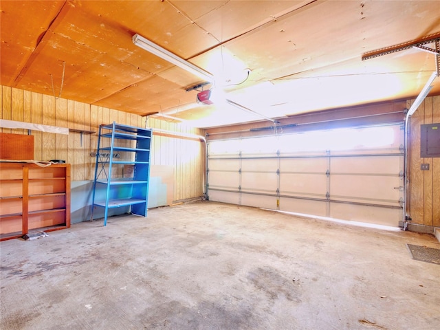 3609 Marwick Dr, Plano, TX 75075 - garage featuring electric panel and a garage door opener