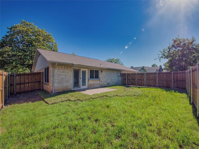 3609 Marwick Dr, Plano, TX 75075 - back of property with brick siding, a patio, and roof with shingles