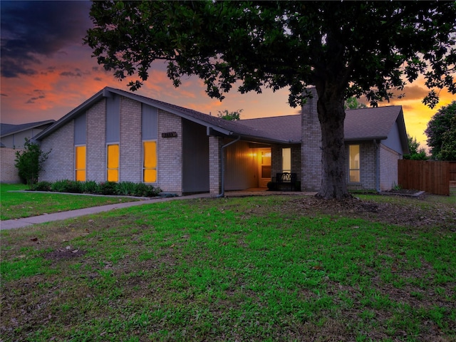 3609 Marwick Dr, Plano, TX 75075 - mid-century modern home featuring a chimney and brick siding