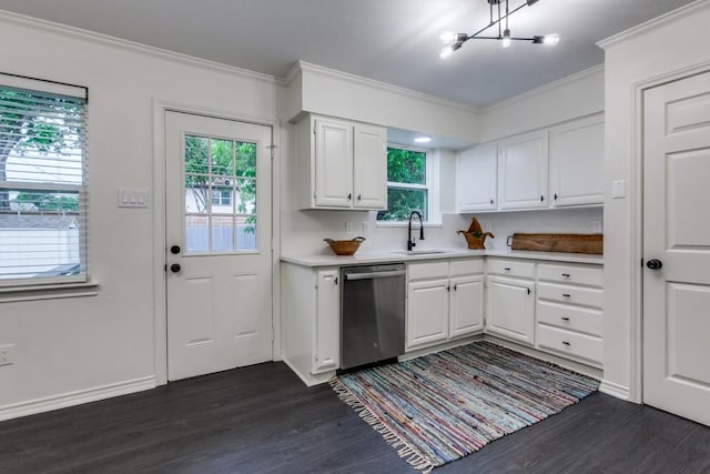 418 Vernet St, Richardson, TX 75080 - kitchen with stainless steel dishwasher, a sink, dark wood-style floors, crown molding, and white cabinetry