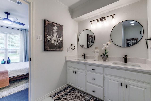 418 Vernet St, Richardson, TX 75080 - ensuite bathroom with double vanity, ornamental molding, a ceiling fan, and baseboards