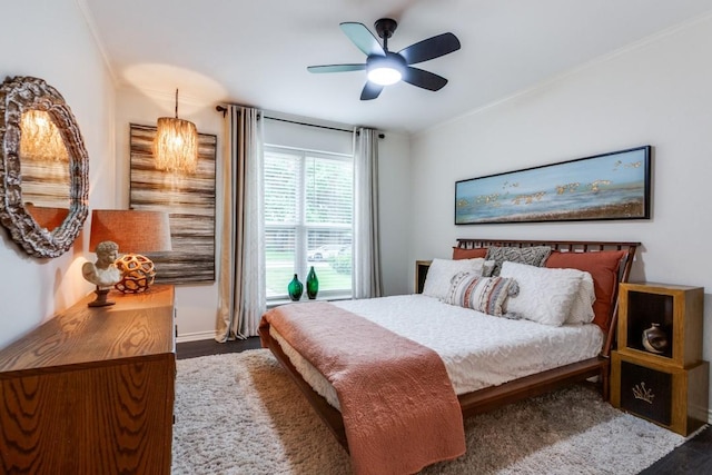 418 Vernet St, Richardson, TX 75080 - bedroom with ornamental molding, baseboards, a ceiling fan, and dark wood finished floors