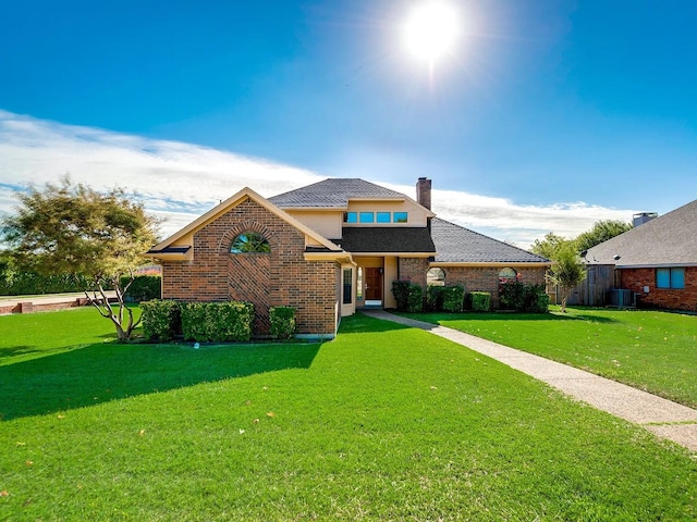 1101 Shawnee Trl, Carrollton, TX 75007 - traditional home with brick siding, a front lawn, and cooling unit