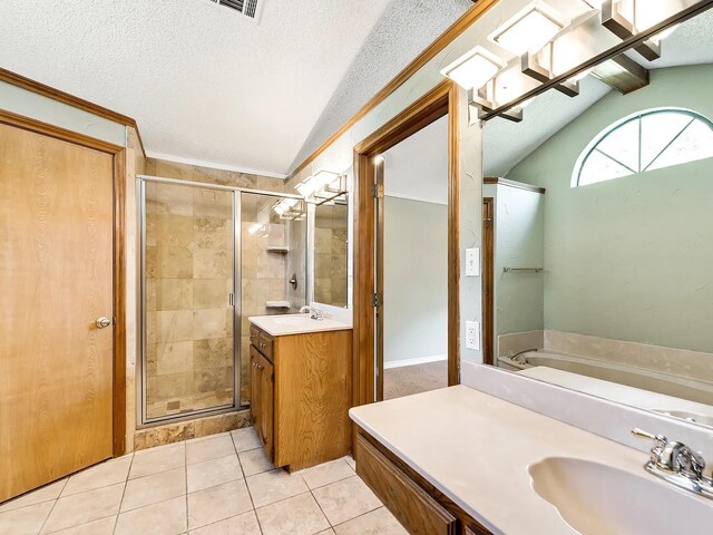 1101 Shawnee Trl, Carrollton, TX 75007 - bathroom with vaulted ceiling, vanity, a shower stall, tile patterned flooring, and a textured ceiling