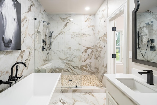 9390 Lakeridge Dr, Princeton, TX 75407 - full bathroom featuring vanity, a soaking tub, and a marble finish shower