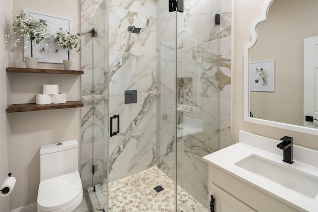 9390 Lakeridge Dr, Princeton, TX 75407 - full bathroom featuring vanity, toilet, and a marble finish shower