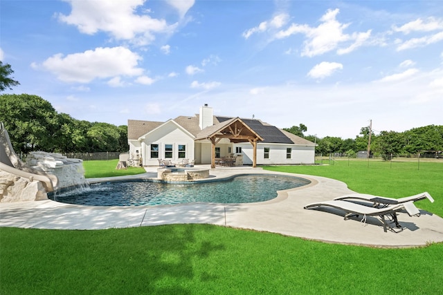 9390 Lakeridge Dr, Princeton, TX 75407 - view of swimming pool featuring a pool with connected hot tub, a patio, and a water slide