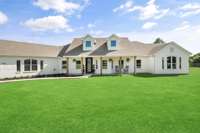 9390 Lakeridge Dr, Princeton, TX 75407 - modern farmhouse with a shingled roof, a front lawn, and covered porch