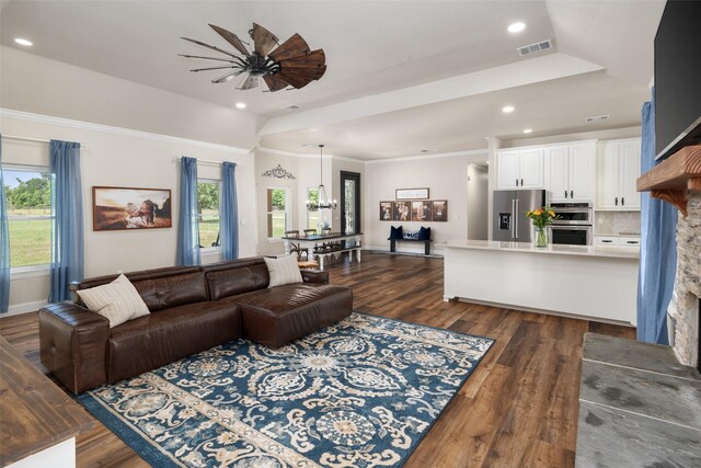 9390 Lakeridge Dr, Princeton, TX 75407 - living room featuring dark wood finished floors, recessed lighting, ceiling fan, baseboards, and lofted ceiling