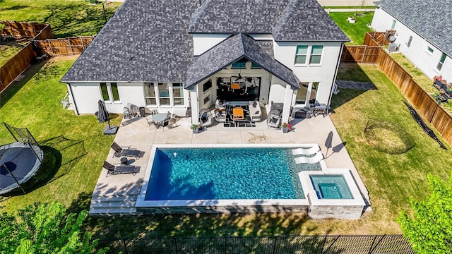 2402 Cornerstone Dr, Mansfield, TX 76063 - back of house with a shingled roof, stucco siding, a patio area, and a pool with connected hot tub