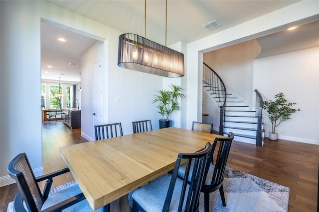 2402 Cornerstone Dr, Mansfield, TX 76063 - dining space with dark wood finished floors, stairs, baseboards, and recessed lighting