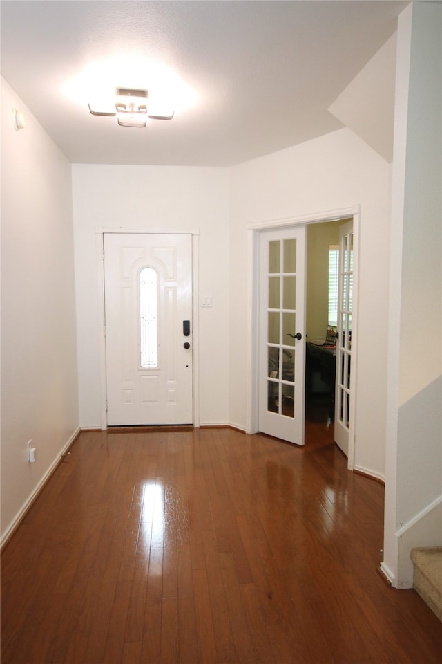 3231 Torio, Grand Prairie, TX 75054 - foyer entrance with french doors, hardwood / wood-style floors, stairs, and baseboards