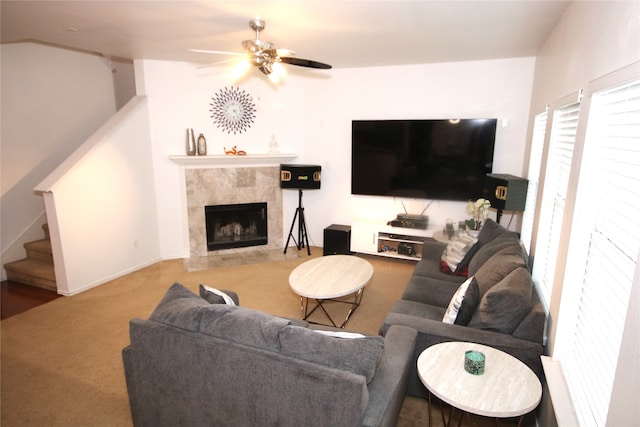 3231 Torio, Grand Prairie, TX 75054 - living room with ceiling fan, stairs, carpet flooring, and a tiled fireplace
