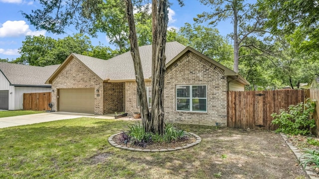 113 Myers Ave, Cleburne, TX 76033 - ranch-style home with brick siding, an attached garage, a shingled roof, and driveway