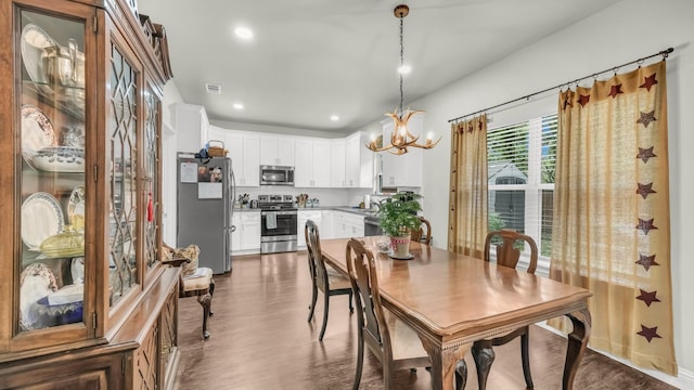 113 Myers Ave, Cleburne, TX 76033 - dining area featuring a chandelier, dark wood finished floors, and recessed lighting