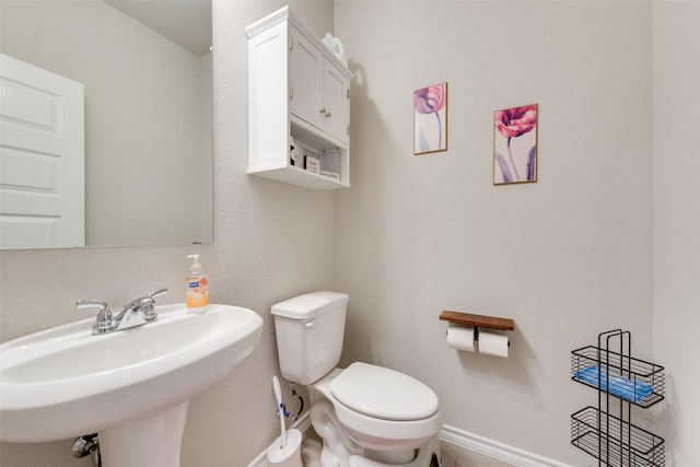 14024 Callisto Way, Haslet, TX 76052 - half bath with toilet, a sink, and baseboards