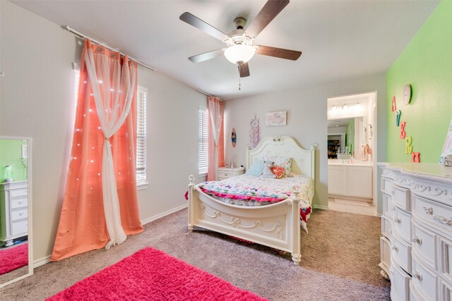 14024 Callisto Way, Haslet, TX 76052 - bedroom with light colored carpet, ensuite bath, and ceiling fan