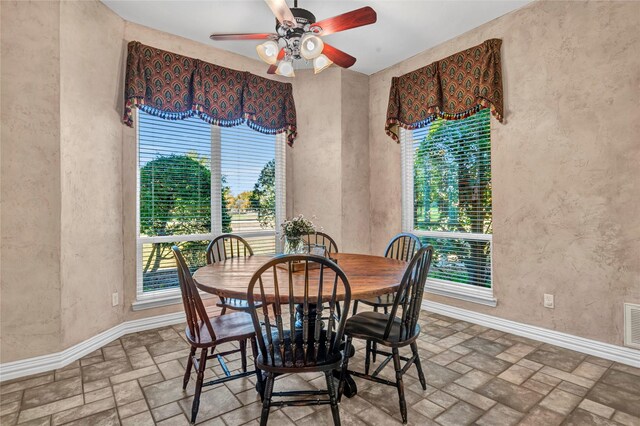 15741 Big Horn Trl, Frisco, TX 75035 - dining area with baseboards, ceiling fan, and brick patterned flooring