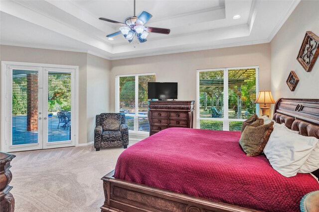15741 Big Horn Trl, Frisco, TX 75035 - carpeted bedroom with access to exterior, multiple windows, a raised ceiling, ornamental molding, and a ceiling fan