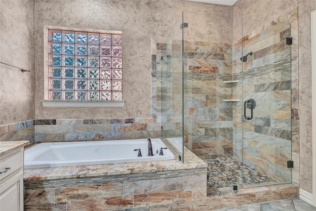 15741 Big Horn Trl, Frisco, TX 75035 - full bathroom featuring a garden tub, a stall shower, and plenty of natural light