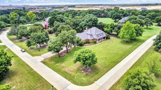 15741 Big Horn Trl, Frisco, TX 75035 - aerial view of a tree filled landscape