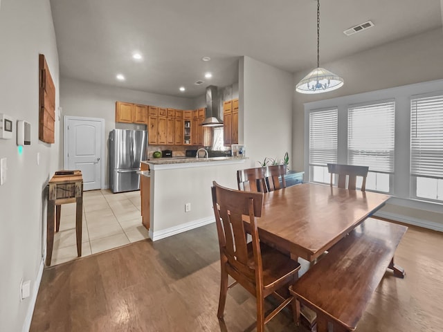 503 S 5th St, Sanger, TX 76266 - dining space featuring light wood-style floors, recessed lighting, and baseboards