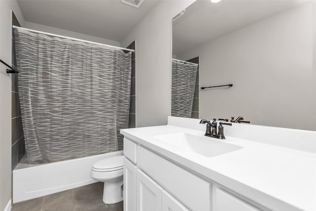 106 Camelia St, Garland, TX 75043 - bathroom featuring vanity, toilet, shower / bath combo, and tile patterned floors