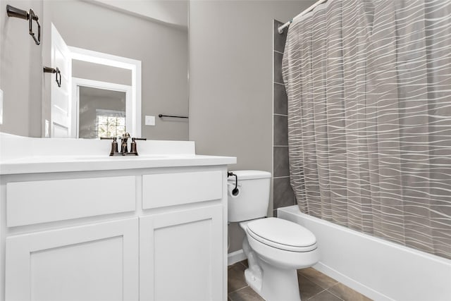 106 Camelia St, Garland, TX 75043 - bathroom featuring shower / tub combo, toilet, vanity, and tile patterned flooring