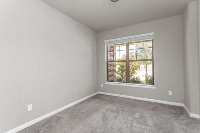 106 Camelia St, Garland, TX 75043 - unfurnished room with baseboards and carpet floors