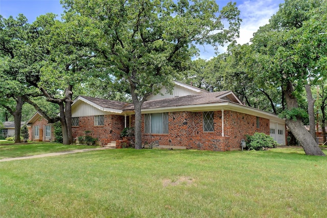 520 Circleview Dr S, Hurst, TX 76054 - view of front of property featuring brick siding, a garage, and a front yard