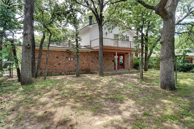 520 Circleview Dr S, Hurst, TX 76054 - back of house featuring brick siding and a patio