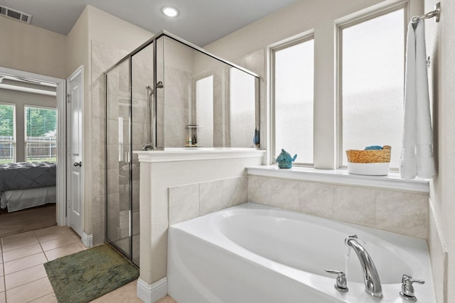 3620 Brahman Ct, Mckinney, TX 75071 - bathroom featuring a bath, ensuite bathroom, a stall shower, tile patterned floors, and recessed lighting