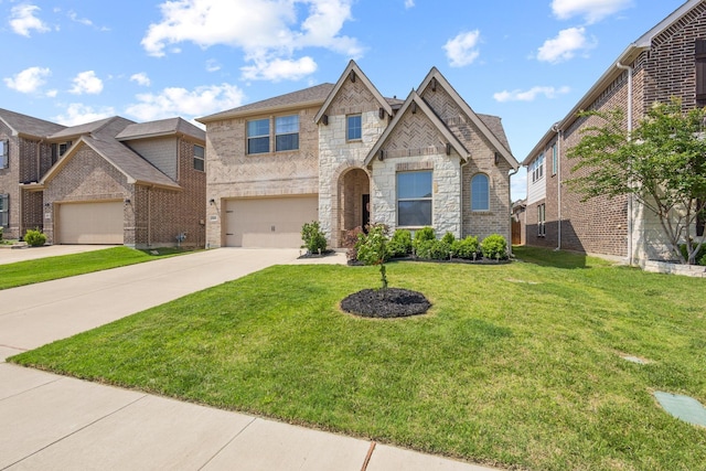 3620 Brahman Ct, Mckinney, TX 75071 - french country home featuring concrete driveway, a front lawn, a garage, and stone siding
